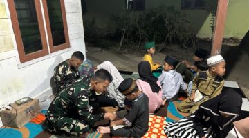 TMMD 128 Langkat Perkuat Mental Anak, Prajurit TNI Ajari Mengaji di Posko Desa Pasar Rawa